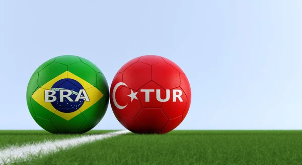 Turkey vs. Brazil Soccer Match - Soccer balls in Turkey and Brazil national colors on a soccer field. Copy space on the right side - 3D Rendering