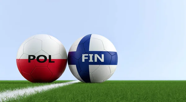 Finland vs. Poland Soccer Match - Soccer balls in Finland and Poland national colors on a soccer field. Copy space on the right side - 3D Rendering