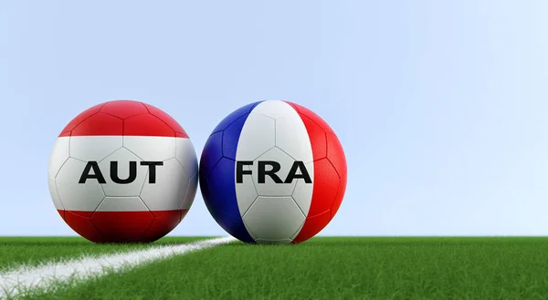 Austria vs. France Soccer Match - Soccer balls in Austria and France national colors on a soccer field. Copy space on the right side - 3D Rendering