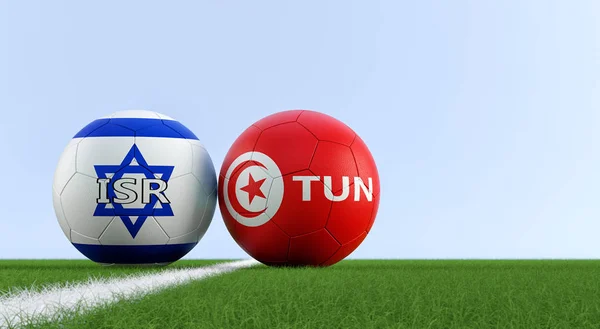 Israel vs. Tunisia Soccer Match - Soccer balls in Israel and Tunisia national colors on a soccer field. Copy space on the right side - 3D Rendering