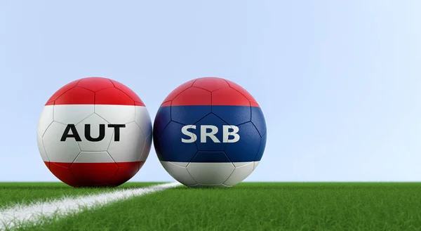 Serbia vs. Austria Soccer Match - Soccer balls in Austria and Serbia national colors on a soccer field. Copy space on the right side - 3D Rendering