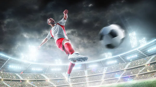 Soccer kick. Professional soccer player in action. Power of sport