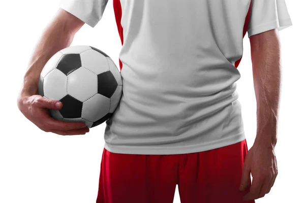 Professionele voetbalspeler Holding Soccer Ball. Close-up. Geïsoleerd op witte achtergrond — Stockfoto