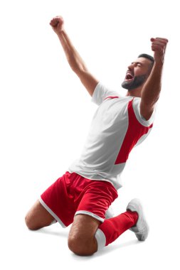 Profesyonel futbolcu zaferi kutluyor. Futbol kutlama. Beyaz arka planda yalıtılmış