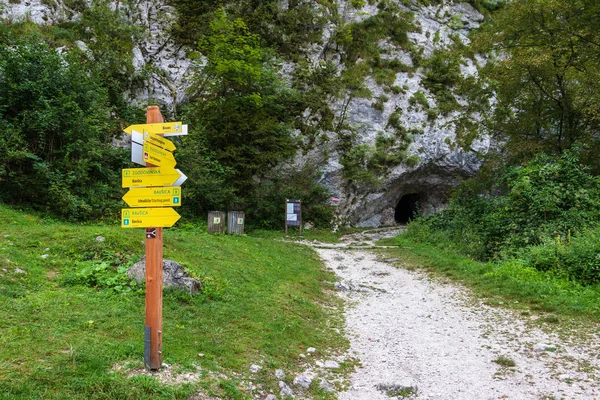 Direction sign show to the path to Fortress Kluze and Fort Hermann. World War I Fortress near Mount Rombon. Bovec, Gorizia, Slovenia.