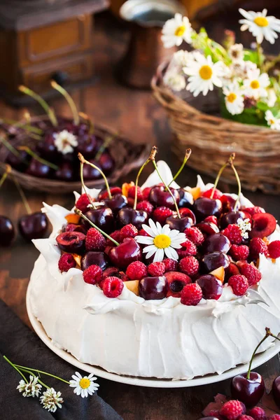 Delicious Pavlova Meringue Cake Decorated Fresh Raspberries Cherries Rustic Background — Stock Photo, Image