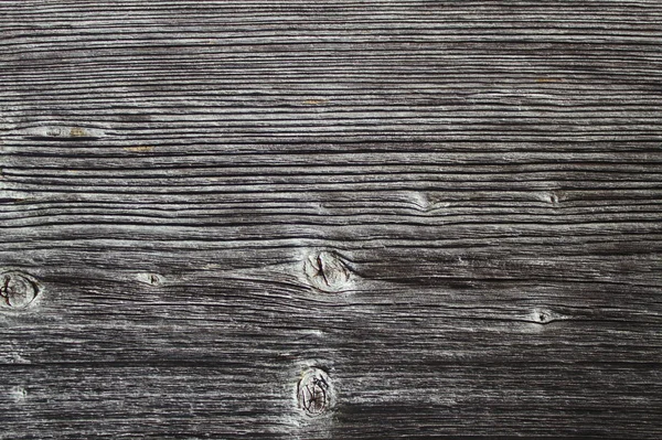 風化した木材を持つ黒い背景 — ストック写真