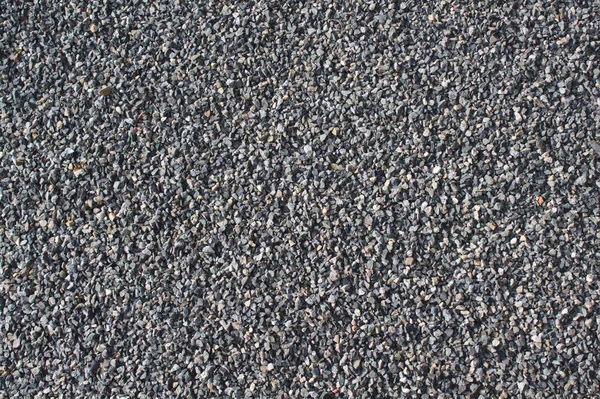 小さな灰色の石を持つ背景 — ストック写真