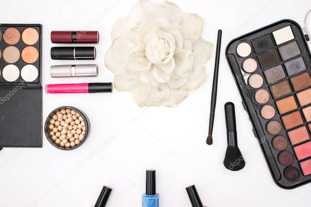 Make up products and accessories on white background 