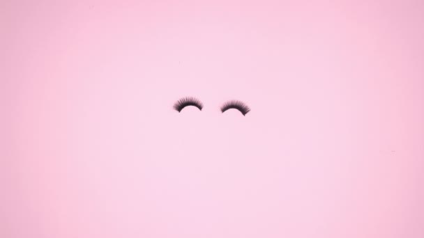 Eye Lashes Blinking Make Products Appear Pink Background Stop Motion — Stock Video