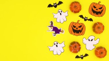 Cadılar Bayramı süslemeleri ve sarı temalı Cadılar Bayramı çıkartmaları. Hareketi durdur 