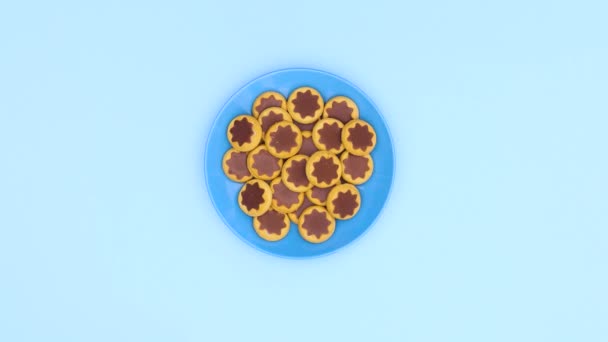 Chocolate Delicious Cookies Blue Plate Blue Background Stop Motion — Stock Video