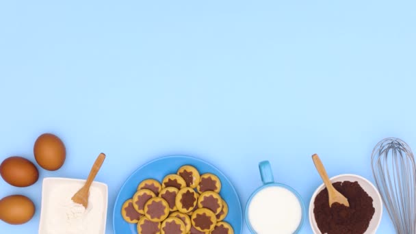Ingredients Baking Chocolate Cookies Plate Blue Theme Stop Motion — Stock Video