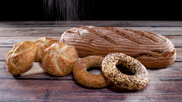 Sprinkling Flour Organic Rye Brad Buns Bagels Table — Stock Video