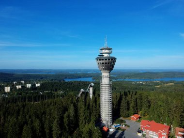 tower over forrest's Finland and Puijon Jumping hills clipart