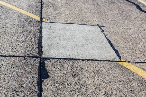 Road marking and signs on an old airstrip — Stock Photo, Image