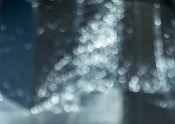 Blurred silver bokeh for backgrounds and compositions — Stock Photo, Image
