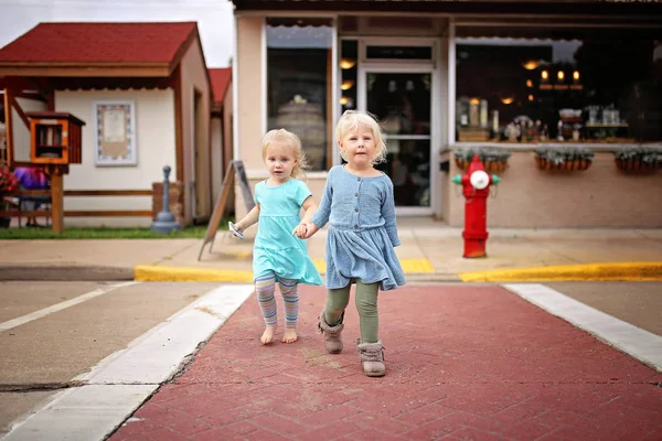 Two Little Toddler Girls Holding Hands Crossing Street One Leading — Stock Photo, Image