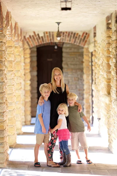 Happy Mother and her Young Children Visiting Old Historic Stone — Stock Photo, Image