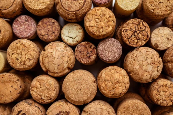 Used wine corks background. Colorful corks from white and red wine bottles