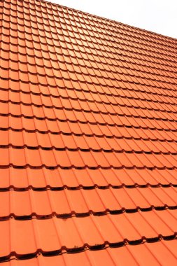Turuncu beton kiremit konut bir ev. Arka plan doku çatı kiremitleri.