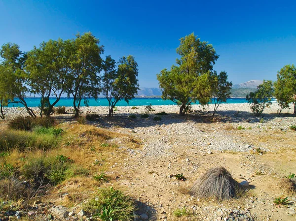 Didyma (literary means twin) beach in Chios island, Greece. Beautiful isolated stone beach with no people. — Stock Photo, Image