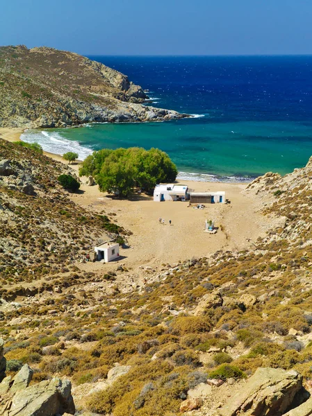 Beautiful greek summer sunny beach bay. View to aegean blue sea with awesome turquoise water. Island paradise. Psili Ammos Beach, Patmos Island, Dodecanese, Greece