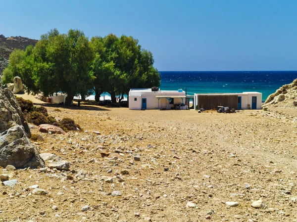 Beautiful greek summer sunny beach bay. View to aegean blue sea with awesome turquoise water. Island paradise. Psili Ammos Beach, Patmos Island, Dodecanese, Greece