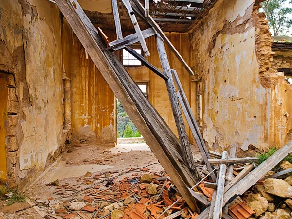 Demolished house ruins, interior detail.