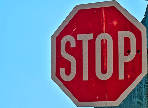 Vivid road stop sign against blue sky background. — Stock Photo, Image