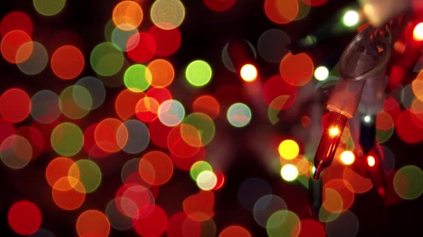 Luces Bokeh con bombillas en primer plano — Vídeo de stock