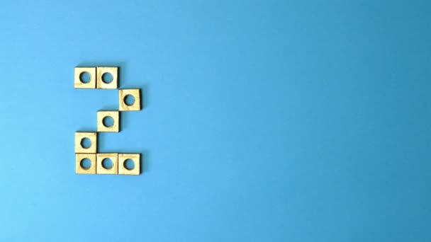 Остановить движение золотых орехов с числами от одного до десяти — стоковое видео
