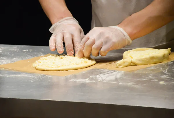 The process of making cakes from dough