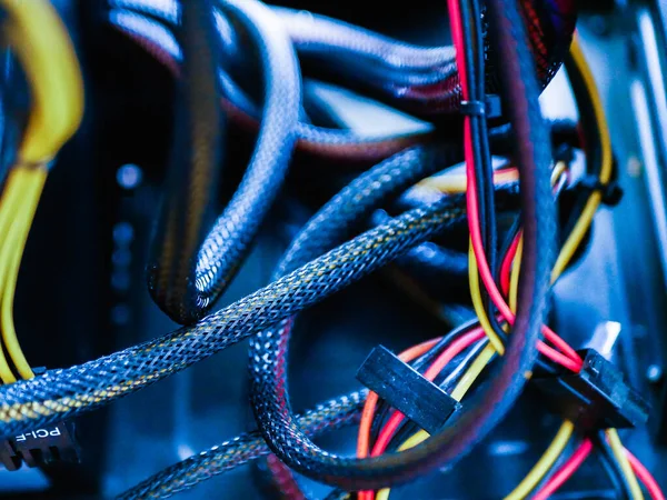 Wires in the system unit of the computer. make-up wires from the power supply. Wires And Parts Inside A Computer System Unit — Stock Photo, Image