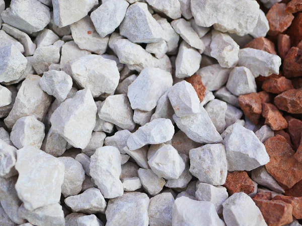 Pedrinhas cinzentas. Antecedentes consiste em pequenas pedras cinzentas. Com muitos usos possíveis. A textura consiste em pedrinhas minúsculas de uma tonalidade cinza . — Fotografia de Stock