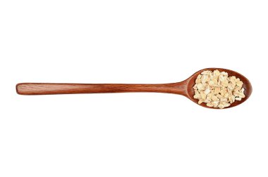 Tahta kaşıkta yulaf ezmesi, beyaz üzerine izole edilmiş. Üst görünüm.