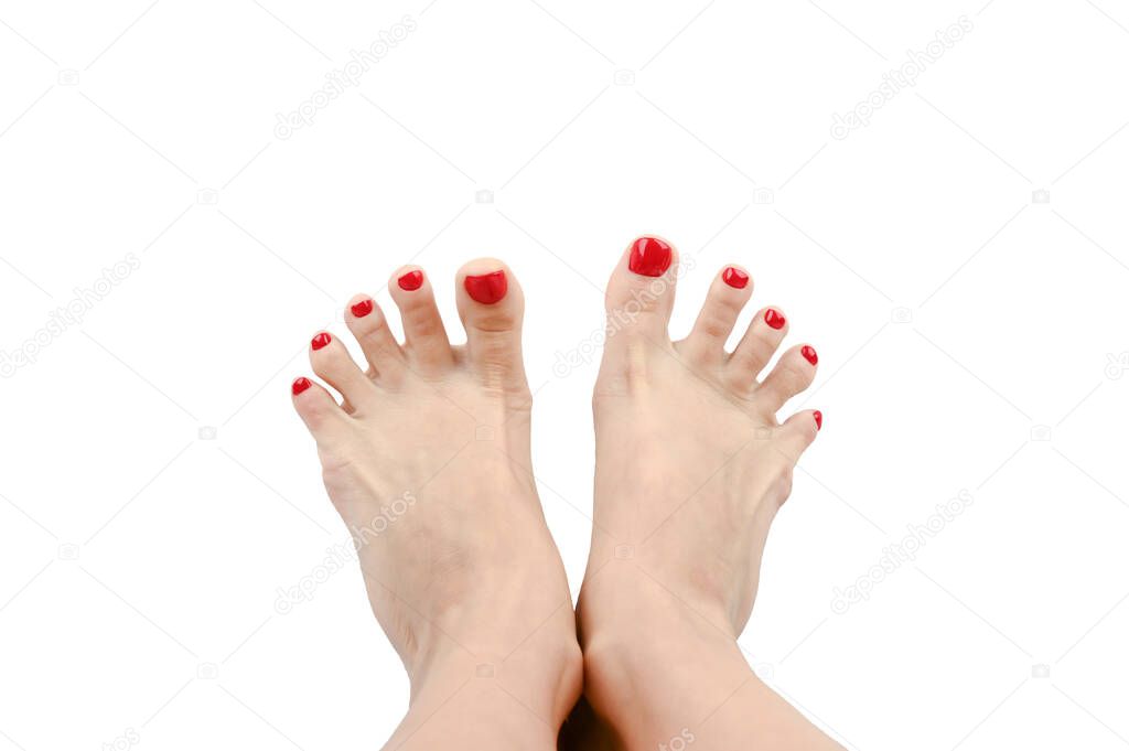 spread your toes. with painted nails in red. on an isolated background. High quality photo