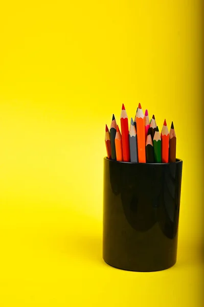 Multicolored Pencils Glass Yellow Background High Quality Photo — Stock Photo, Image