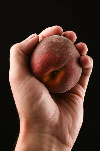 Squeeze Peach Your Hand Isolated Background High Quality Photo — Stock Photo, Image