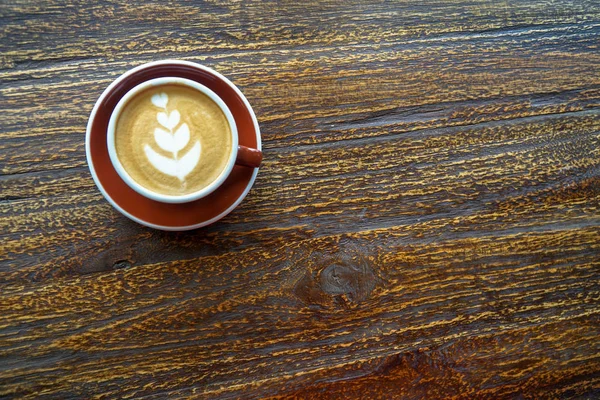 Een kopje koffie met mooie latte art — Stockfoto