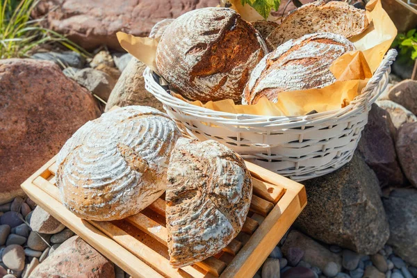 Organic homemade bread. Freshly baked artisan sourdough bread. Healthy food. With 100% whole-grain, sprouted flour and without added sugars and vegetable oils.