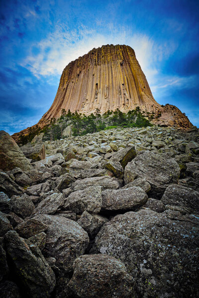 Devils Tower with large boulders.