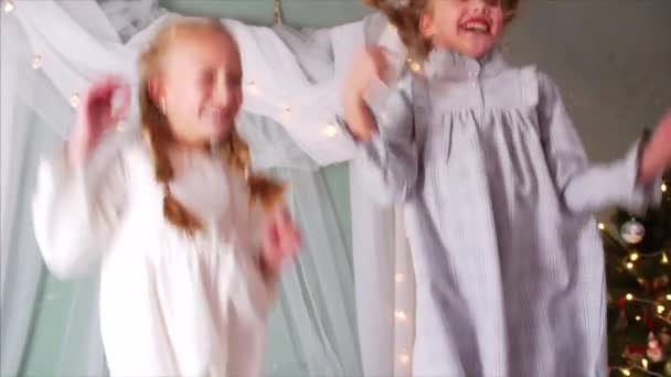 Slow Motion Two Sisters Braids Nightwear Jumping Bed Laughting Having — Stock Video