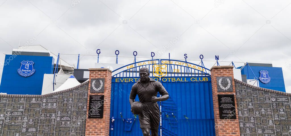 Dixie Dean statue in front of the Wall of Fame outside the home of Everton FC in England seen in June 2020.