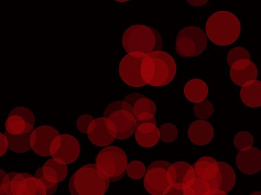 Siyah arka plan üzerinde kırmızı bulanık soyut topları