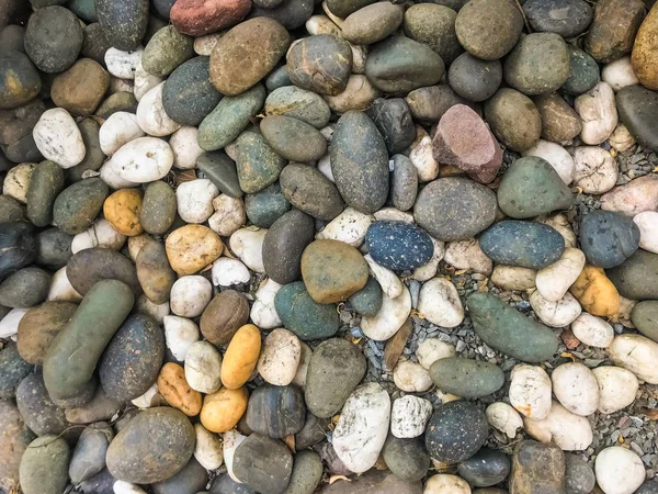 A variety of bright colored pebbles