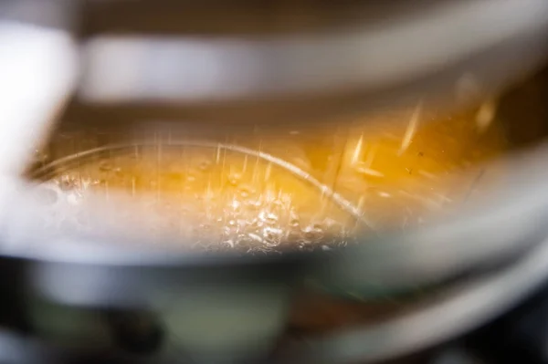 Strain the poured honey through a sieve. How to Harvest Honey. Filtering raw honey, France