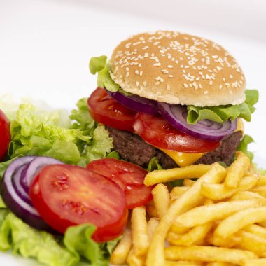 Burger, patates kızartması göğsü ile peynir ve domates, Fransa