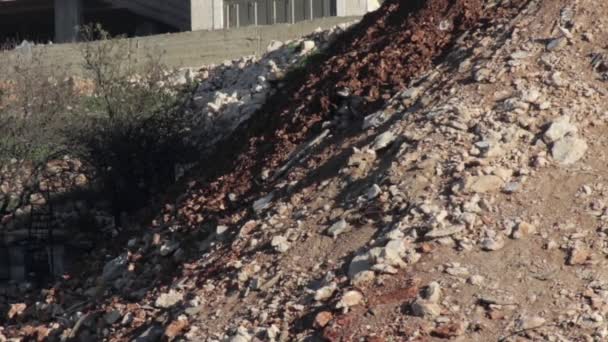 Tractor Pushing Garbage Stone Sand Palestinian Neighborhood — Stock Video