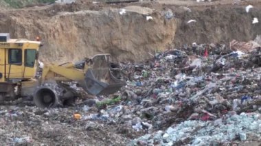 Site, Hindistan kazıcı kamyon çöp sitesinde Guwahati döker